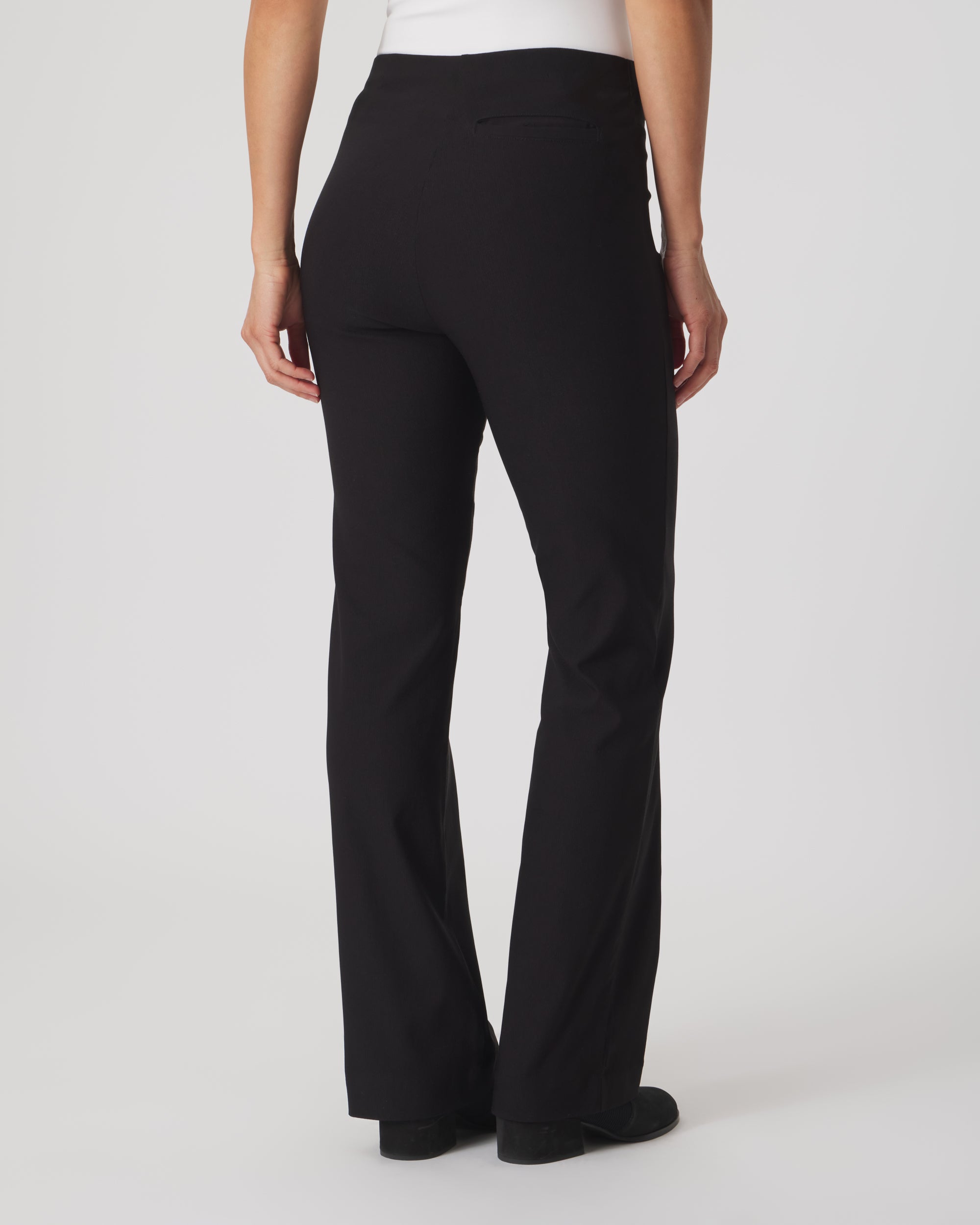 Bootcut Magic Pant in Black, back view with welt pocket