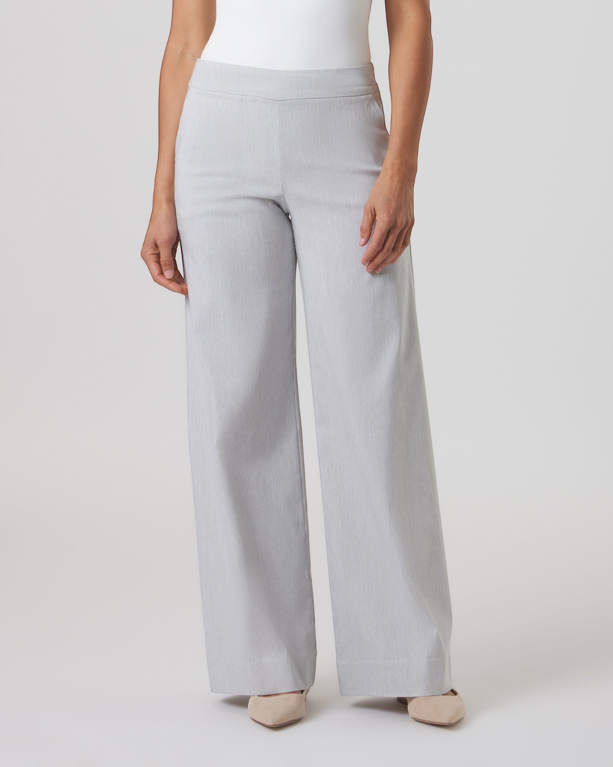 Franne Golde Mayfair wide leg pants in light grey pinstripe with a contoured pull-on waistband and slant pockets.