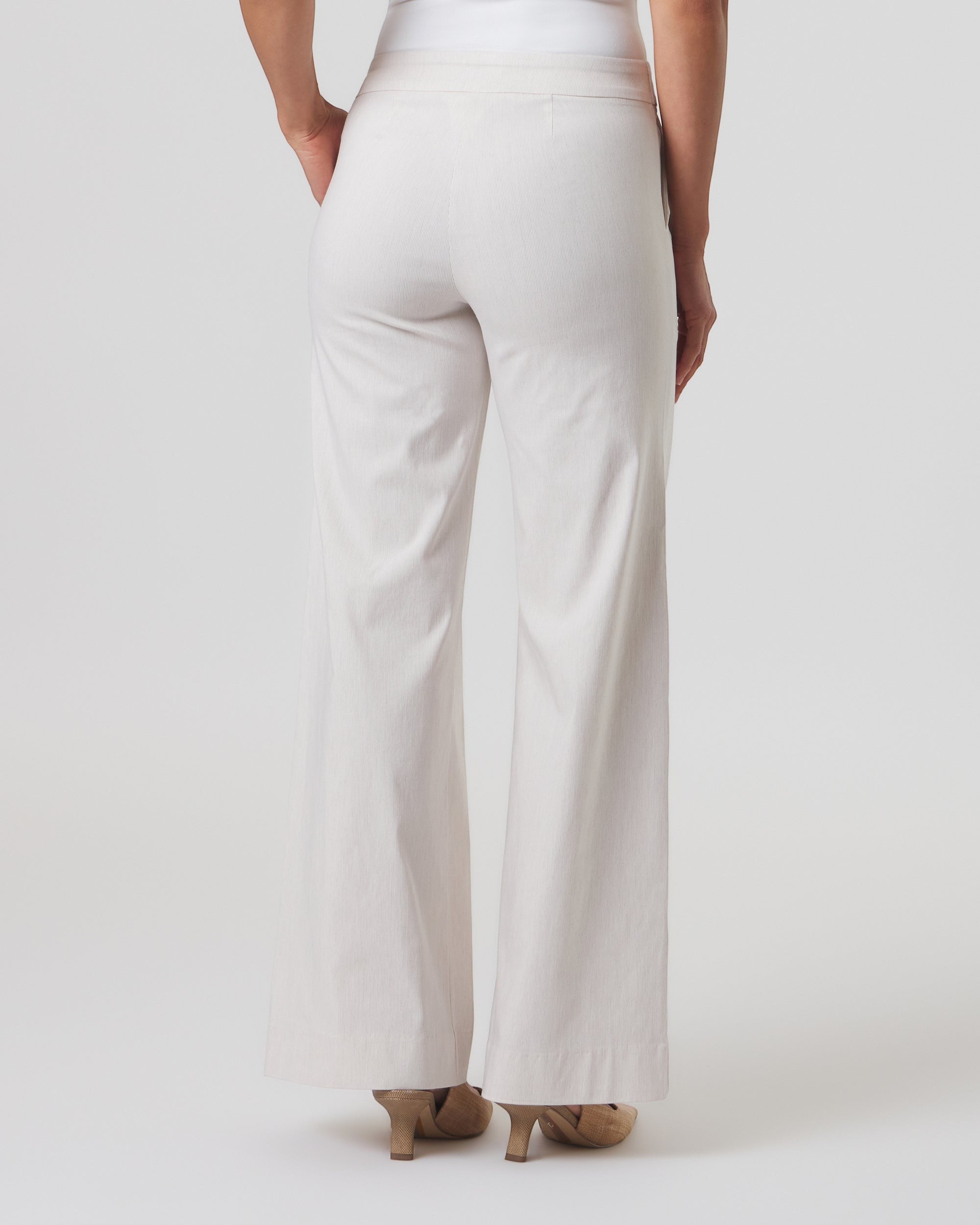 Back view of Franne Golde Mayfair wide leg pants in white pinstripe fabric with a contoured waistband.