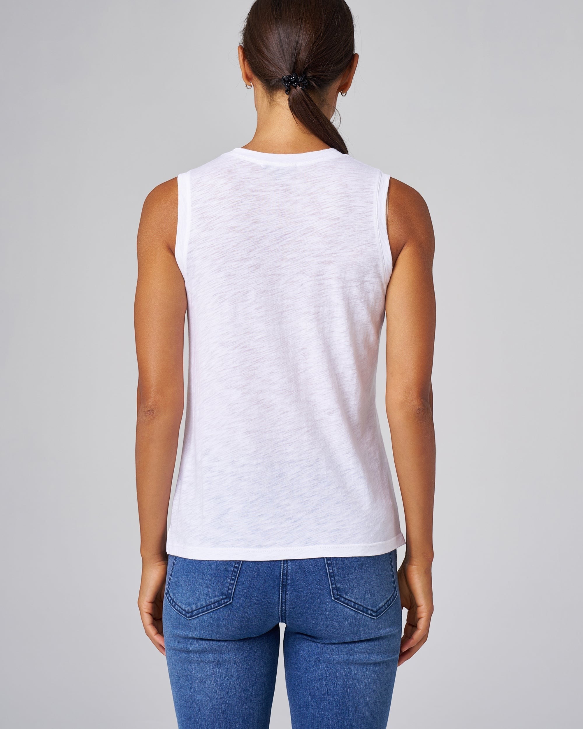 Franne Golde white slub jersey v-neck tank top made of cotton-modal with a relaxed fit and side slits.
