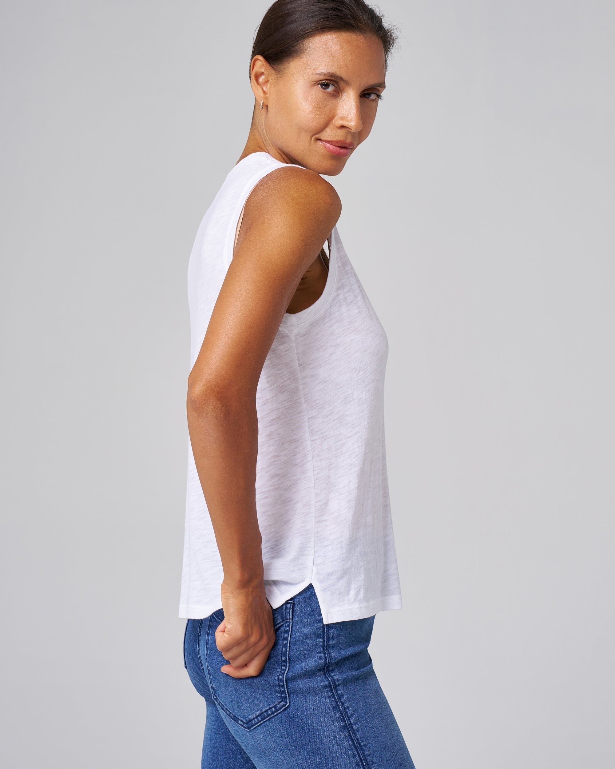 Franne Golde white slub jersey v-neck tank top made of cotton-modal with side slits for versatile styling.